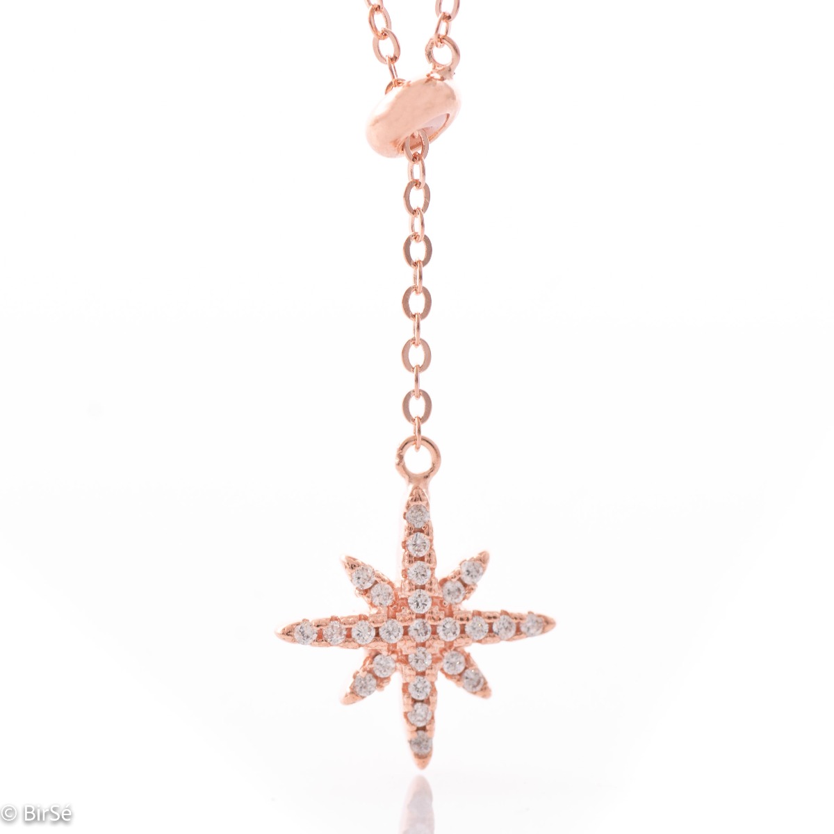 An exquisite necklace in soft pink silver with a beautiful star pendant, fully decorated with sparkling zircons. All jewelry is gift-wrapped and accompanied by a certificate of quality and warranty.