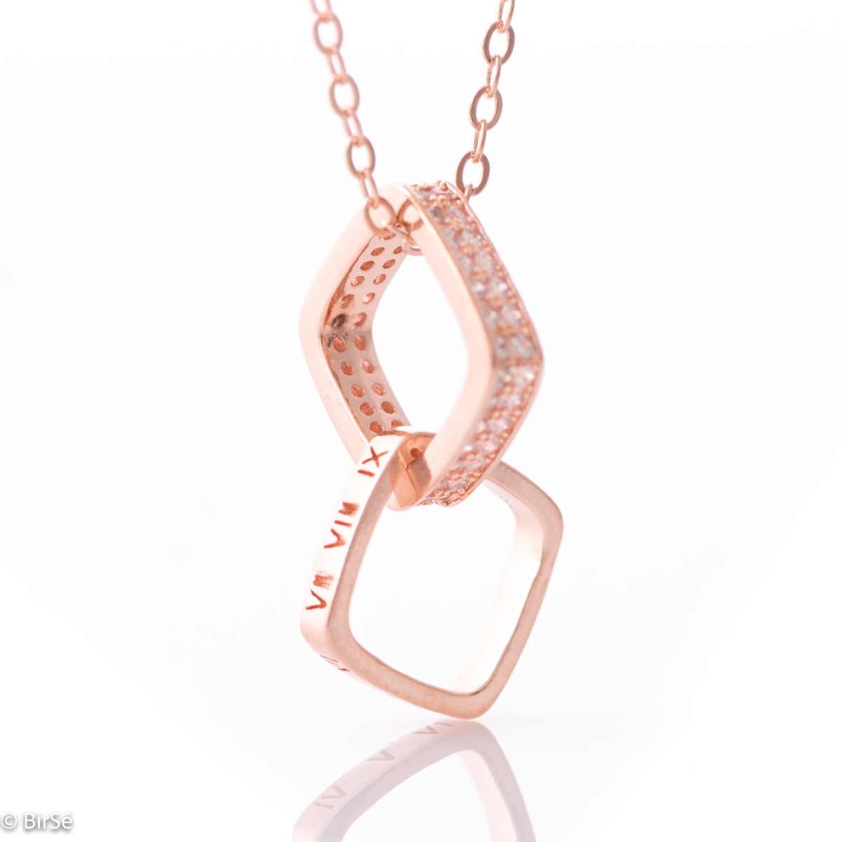 A broken model silver women's necklace of two interlocking rhombuses, decorated with zircons and Roman numerals. A very different and sophisticated model for your silver jewelry collection.