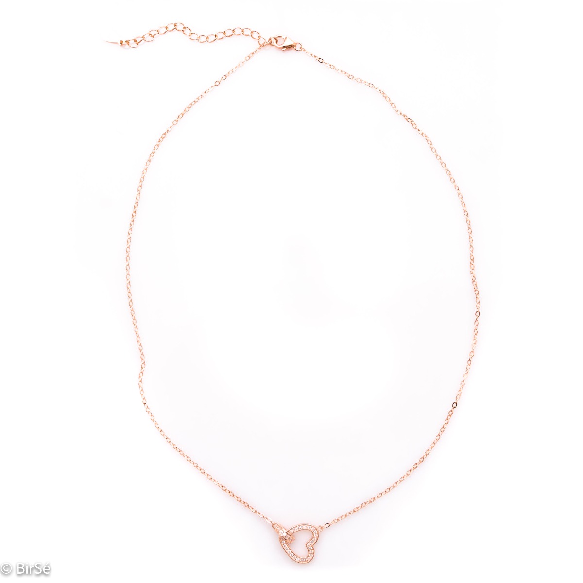 A stylish necklace in soft rose silver with an asymmetrically placed dainty heart, all encrusted with sparkling zircons.