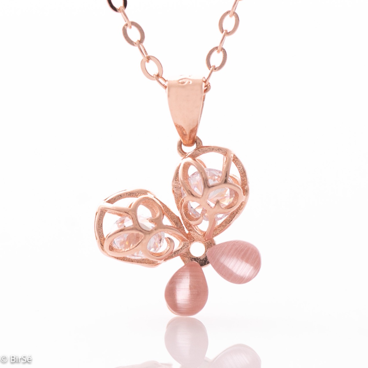 A lovely creation of a butterfly necklace, with beautiful openwork wings made of rose silver. The wings are hollow and a glistening cubic zirconia glistens inside, while the other wings are made of a delicate pink Cat's Eye stone.