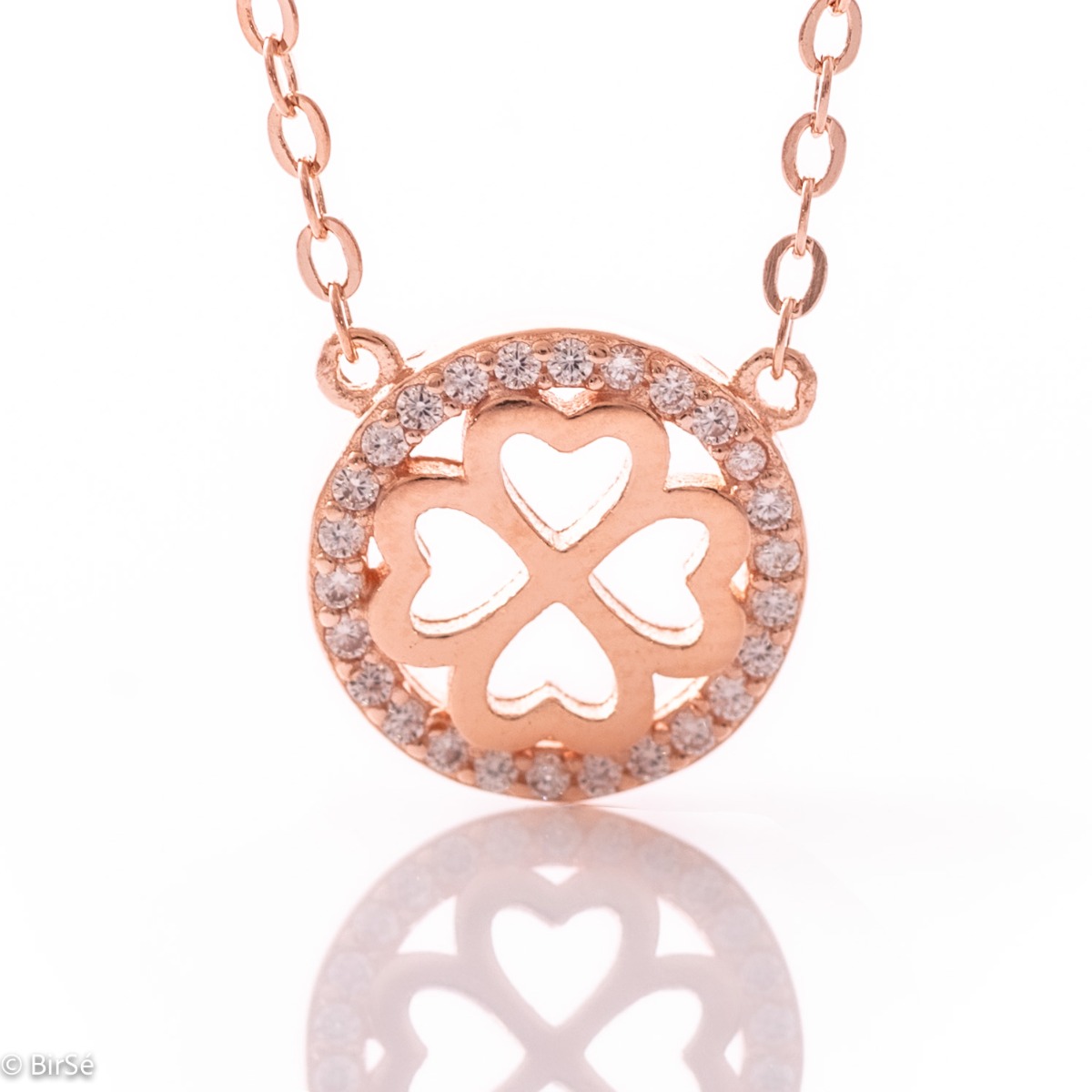 An exquisitely shaped necklace of sparkling rose silver circle, with a beautiful four-leaf clover inside.