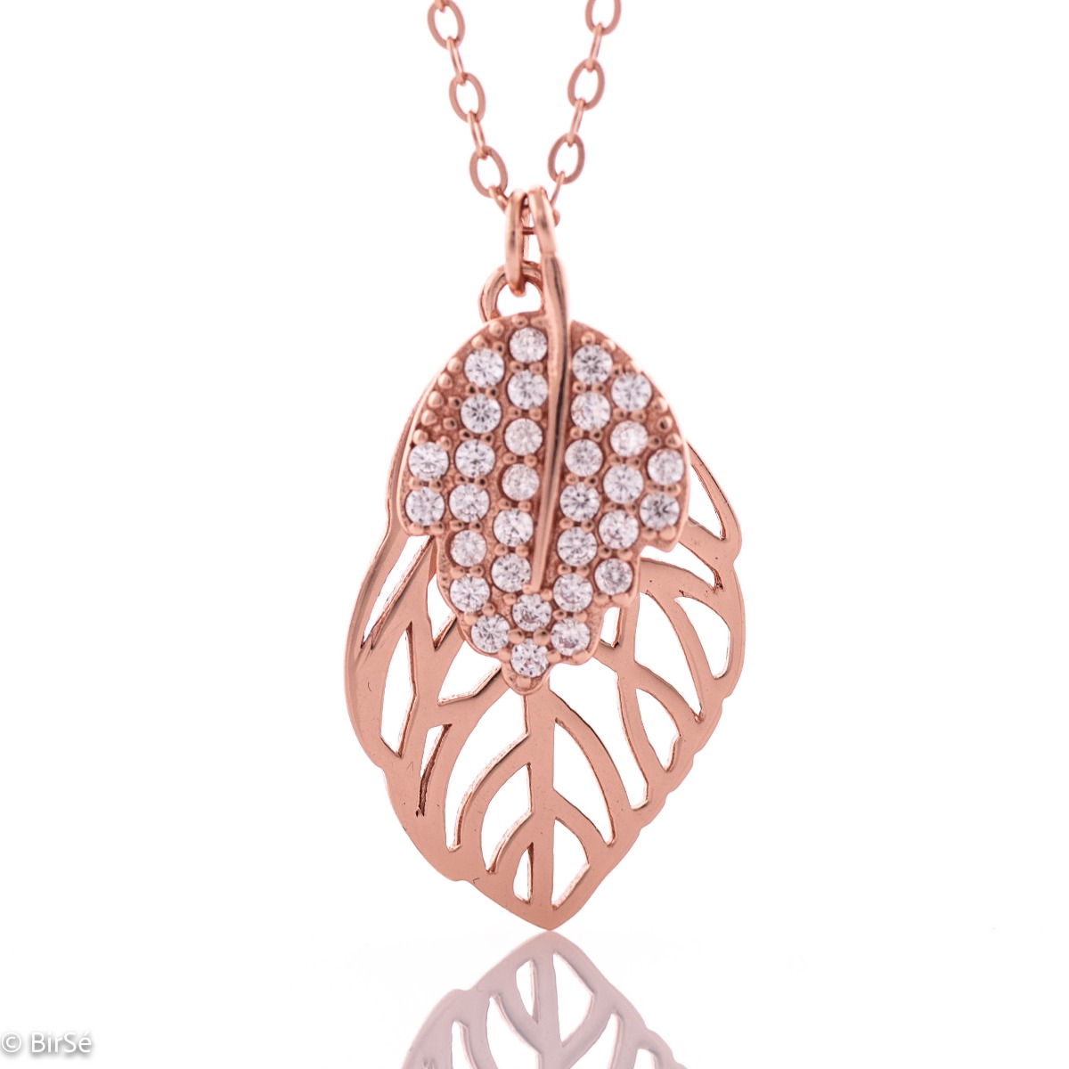 Extremely fine and delicate workmanship of a necklace of soft rhodium-plated rose silver in the shape of a leaf. Stylish design of the details with the addition of sparkling white zircons.