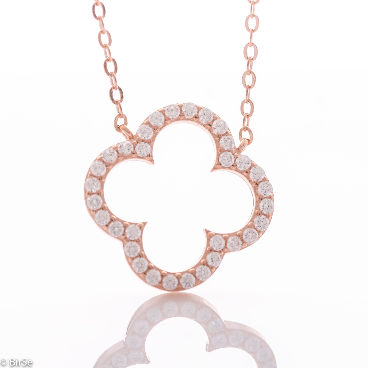 Delicate and sophisticated rose silver necklace in the shape of a clover, beautifully studded with sparkling zircons. A fashionable and popular type of jewelry for sophisticated ladies.