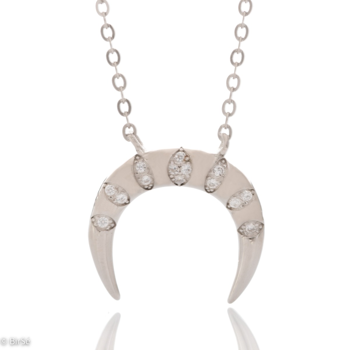 Delicate women's necklace with an exquisite design of rhodium-plated silver in the shape of a rainbow. The jewel has an elegant chain holding an element with added fine zircons. The added extension helps to adjust the length according to the client's wish