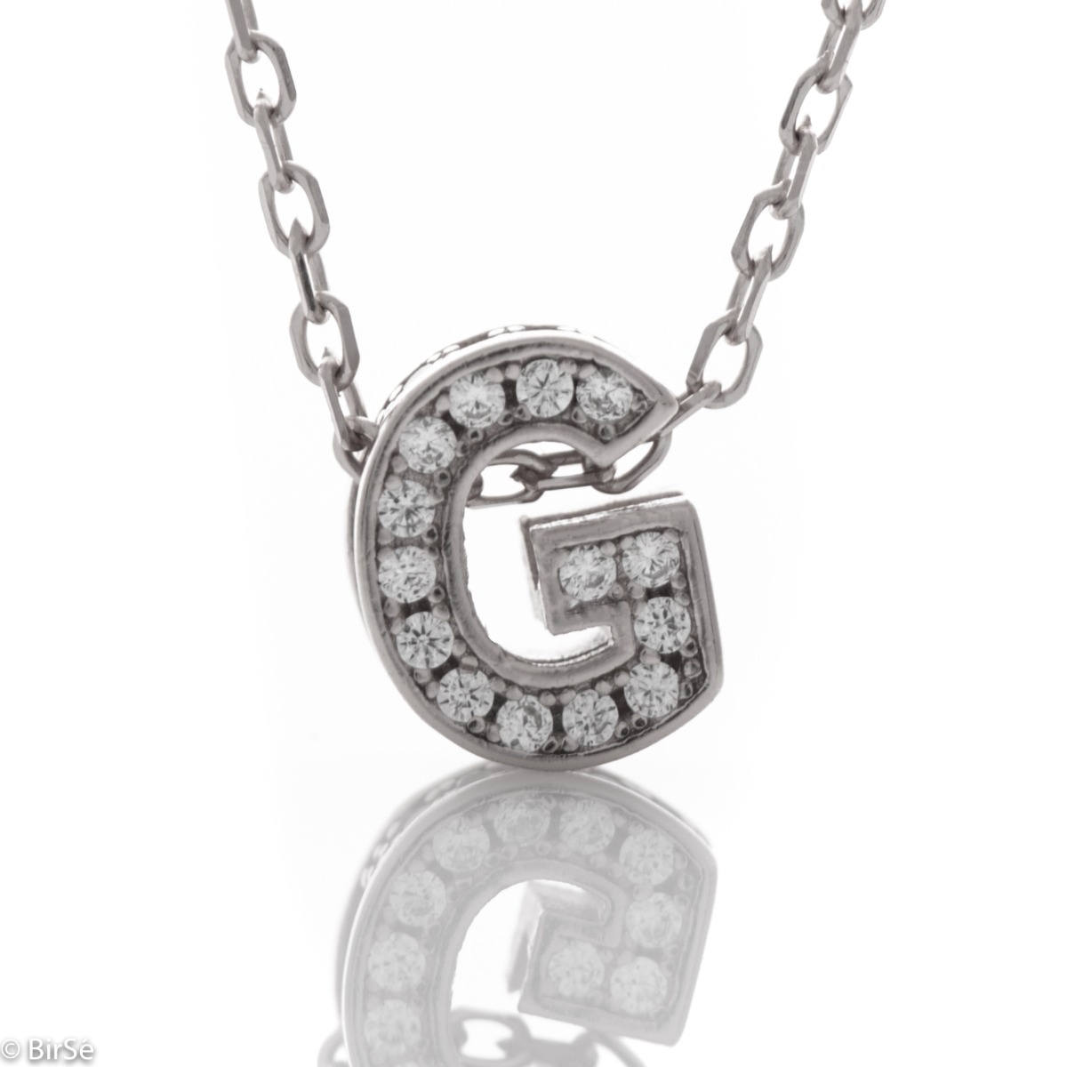 Finely crafted rhodium silver letter G necklace for women, all encrusted with glittering zircons. An attractive piece of jewelry in which the delicate beauty of rhodium-plated silver is skilfully combined with the brilliance of zircons.