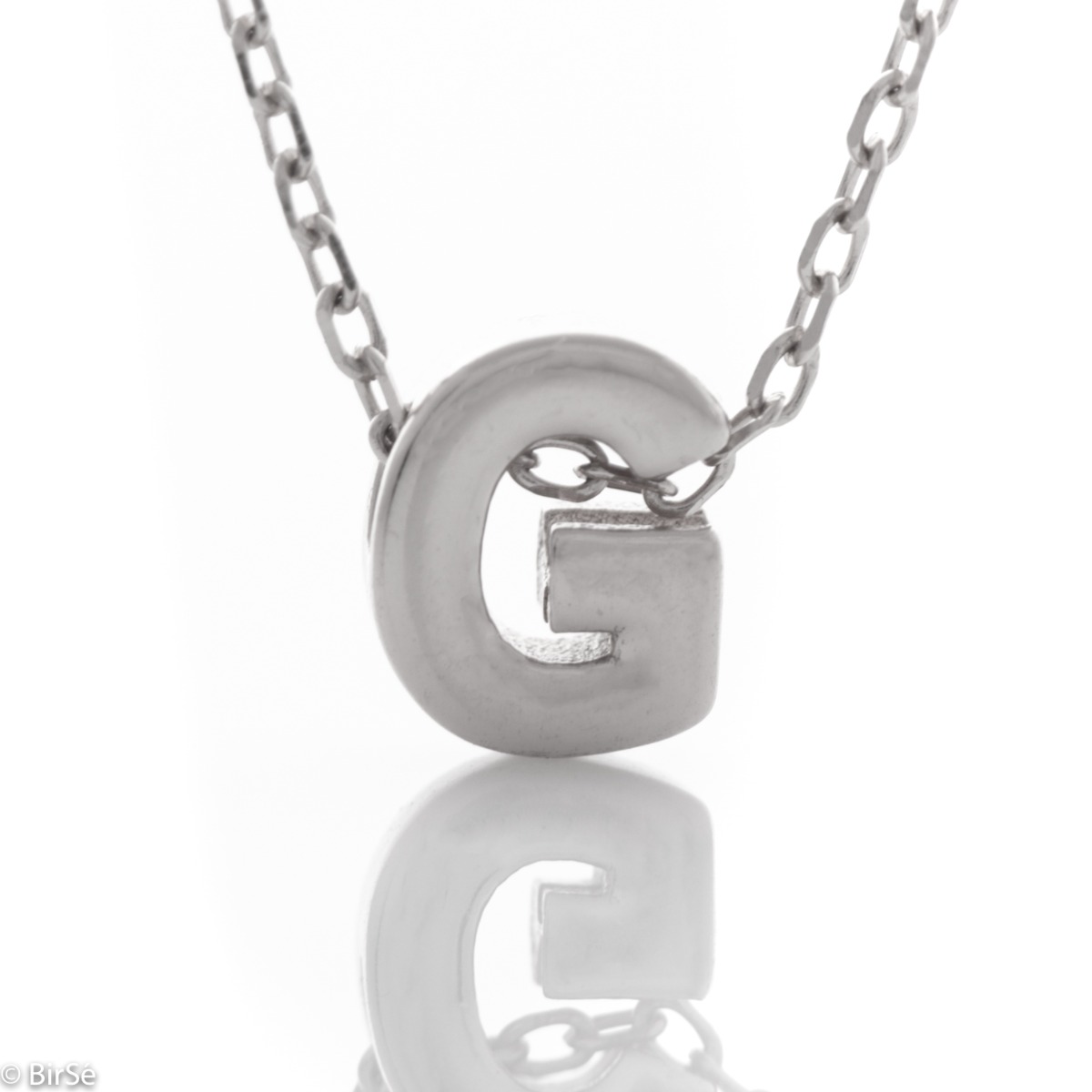 Finely crafted rhodium silver letter G necklace for women. A delicate and spectacular piece of jewelry, simple and cleverly combined with any kind of glittering silver jewelry.