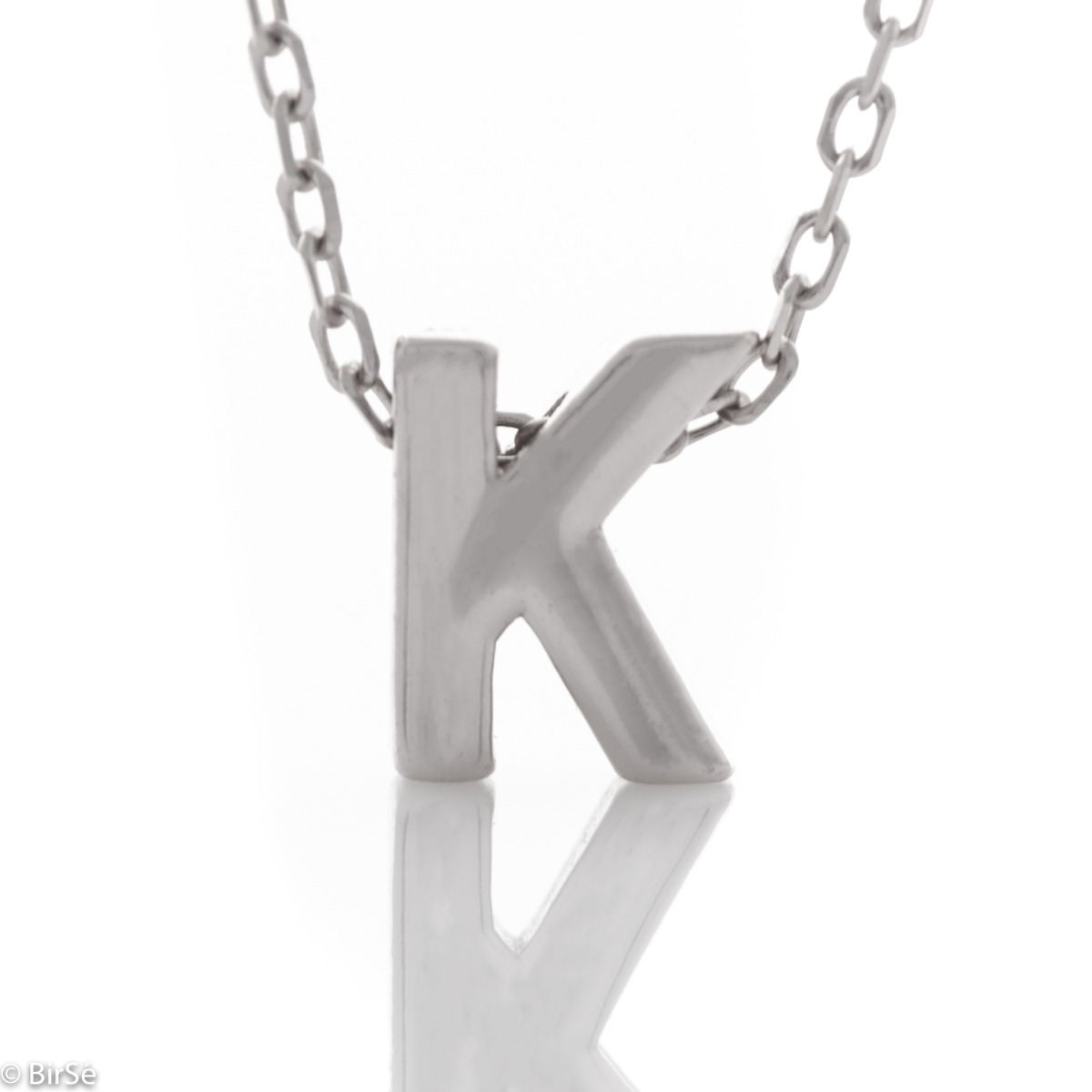 A simple necklace made of shiny rhodium silver with a beautiful letter K. The necklace is suitable for everyday wear in combination with various silver jewelry.