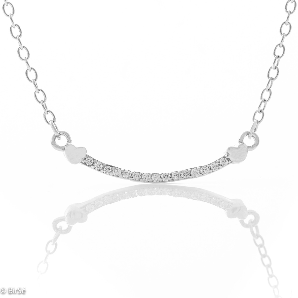 An elegant rhodium-plated silver necklace with finely worked rows of sparkling zircons. Small charming hearts are placed at both ends, connecting the zircons to the delicate chain.