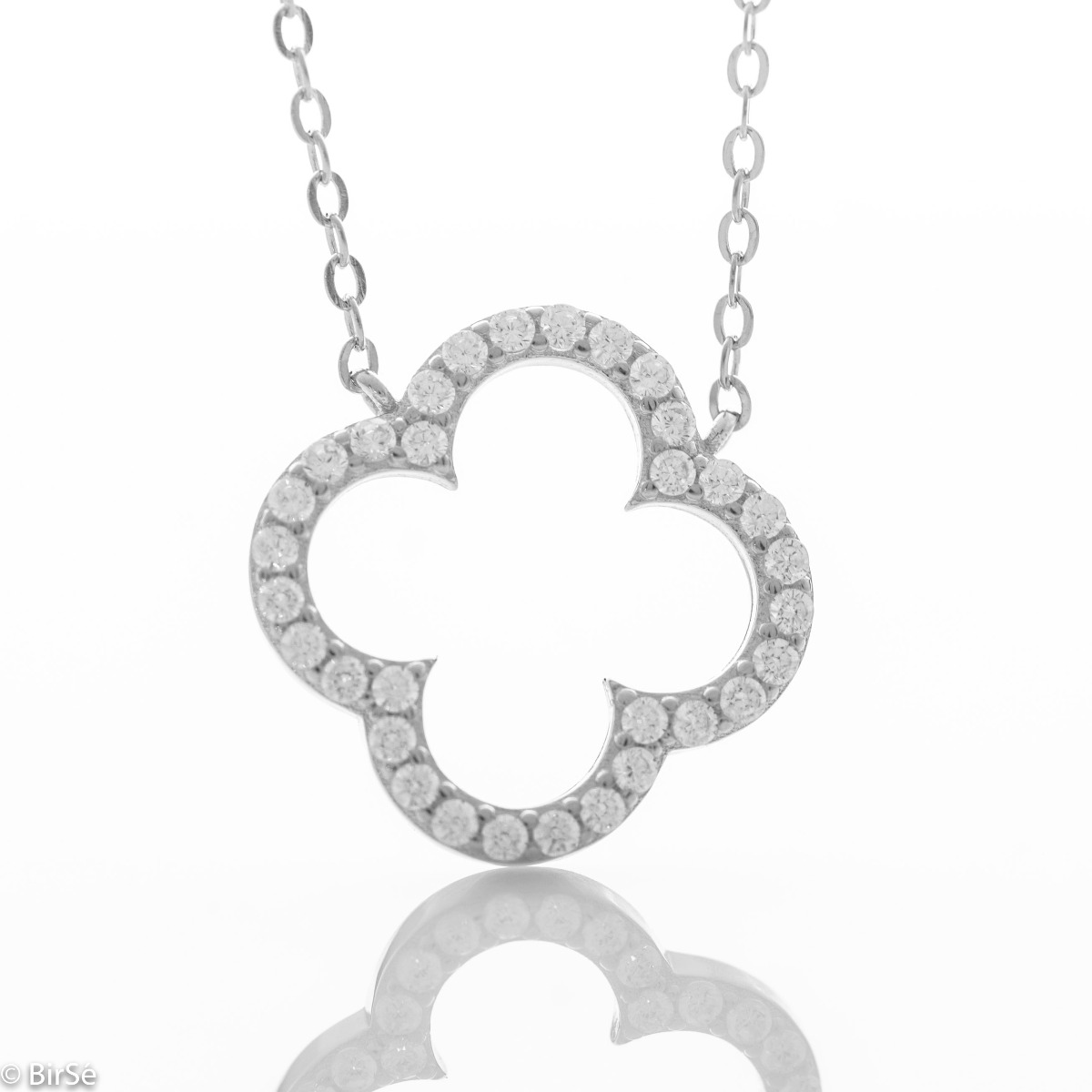 A delicate and sophisticated sterling silver necklace in the shape of a clover, beautifully studded with sparkling zircons. A fashionable and popular type of jewelry for sophisticated ladies.