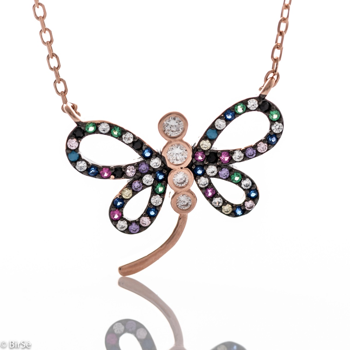 A fabulously beautiful necklace made of rhodium-plated rose silver - a lovely dragonfly, with wings studded with multi-colored glittering zircons.