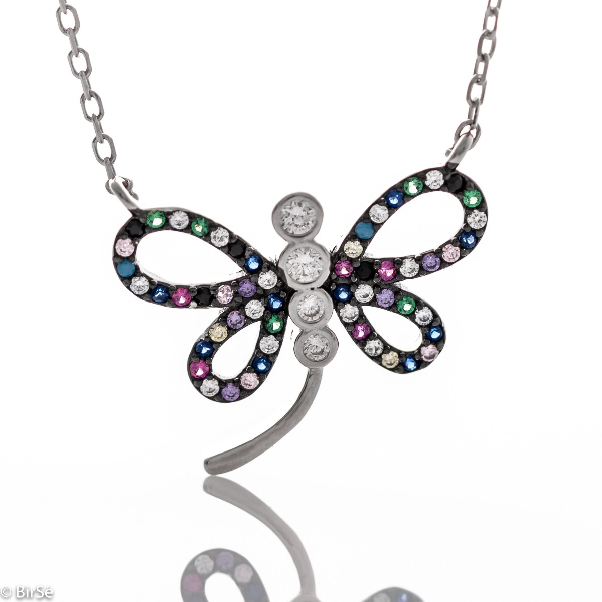 An elegant women's necklace in the shape of a dragonfly, masterfully sculpted from rhodium-plated silver and studded with delicate multi-colored zircons.