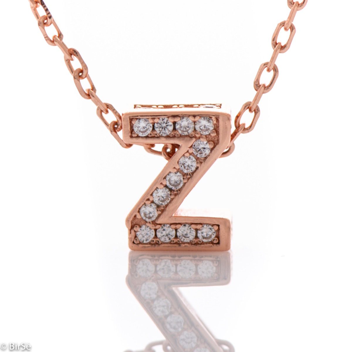 Finely crafted rose silver letter Z necklace for women, all encrusted with glittering zircons. An attractive piece of jewelry in which the delicate beauty of rose silver is skilfully combined with the brilliance of zircons.