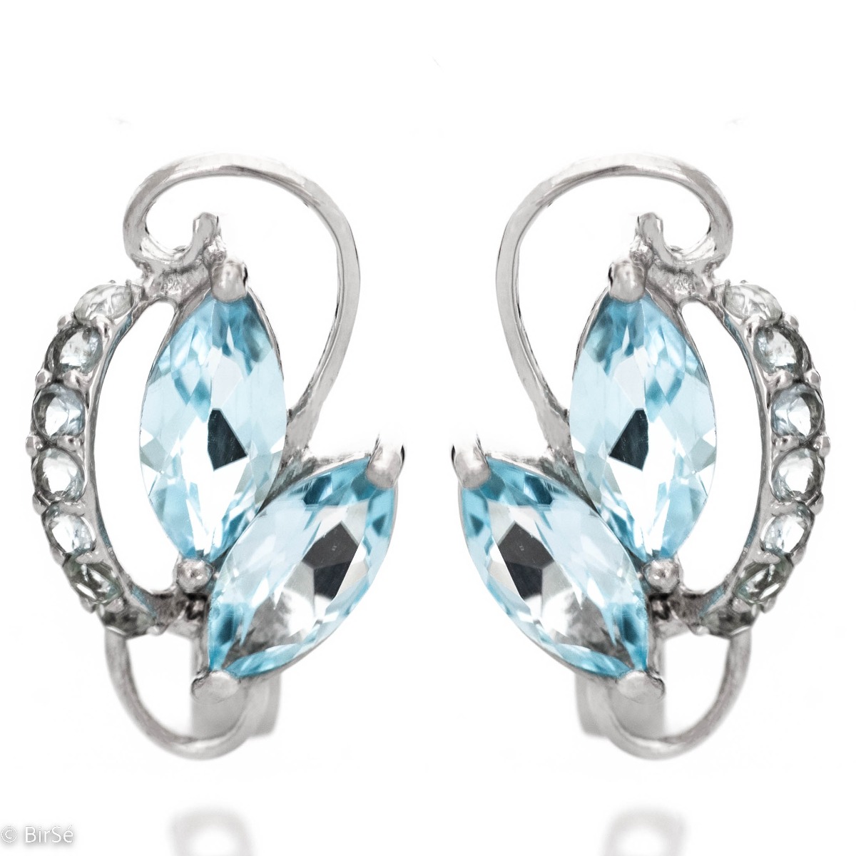 Shine bright with the rhodium silver and stunning blue topaz silver earrings set. The earrings have an English clasp and come complete with an irresistible ring and pendant.