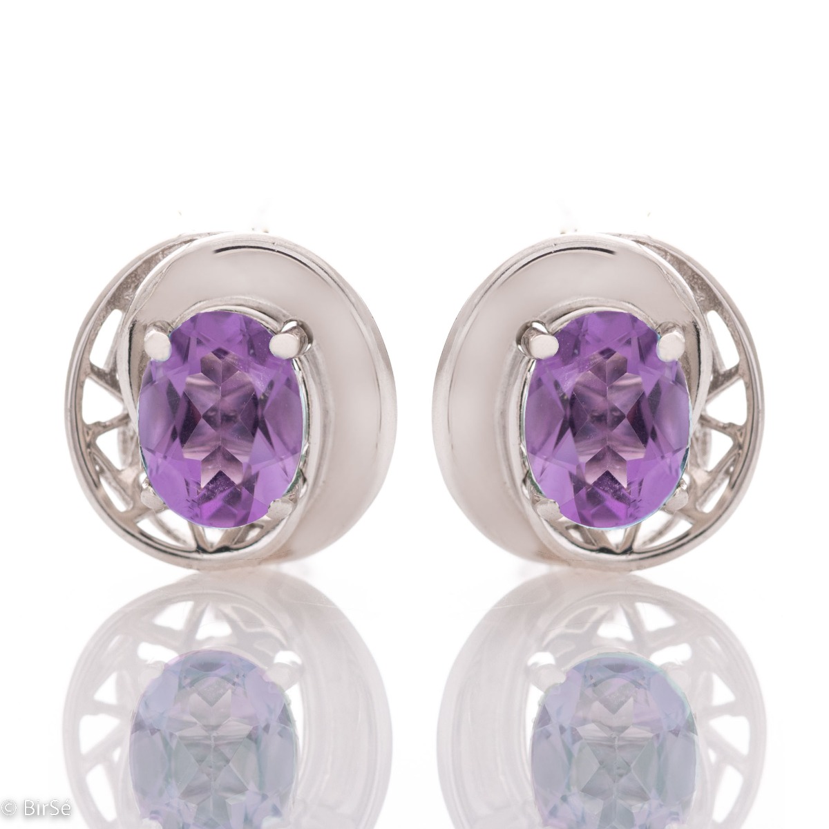 Stunning ladies earrings finely crafted from natural amethyst and rhodium silver. Their magic is enhanced with a pendant and ring from the same collection and the same indescribable design.