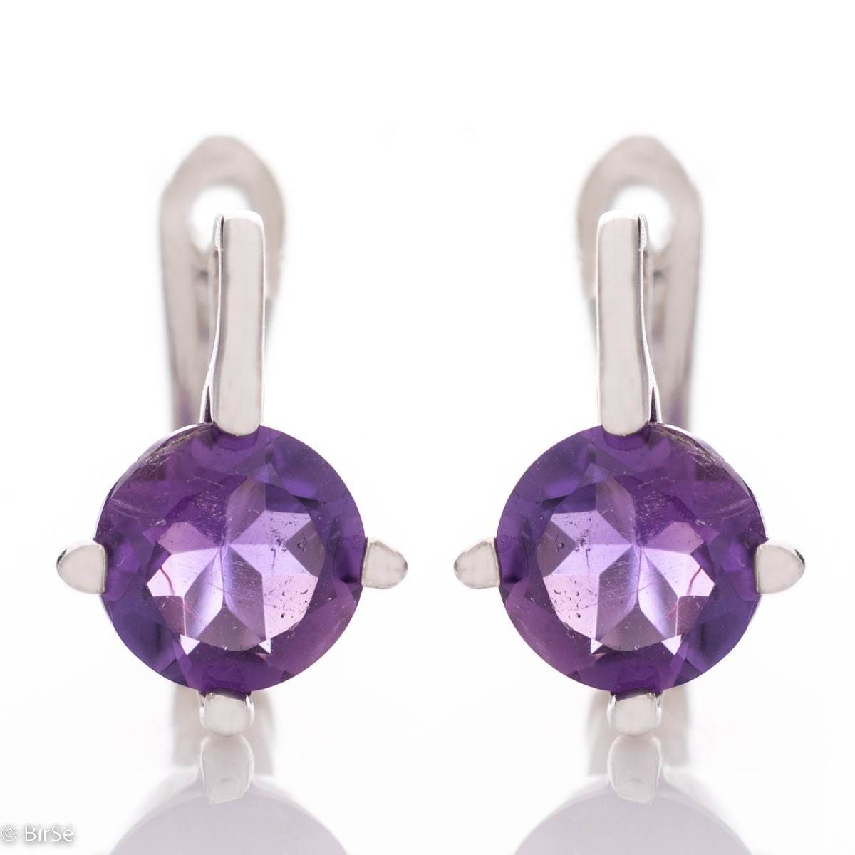 Delicate earrings simple design and radiant natural amethyst. They are made entirely of beautiful rhodium silver with a comfortable English clasp. A spectacular ring and pendant complete the set.