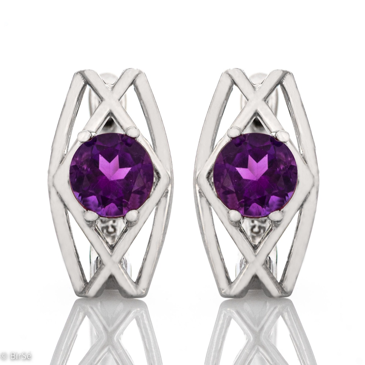 Delicate earrings with refined rhodium silver. A magnificent natural amethyst adorns the earrings and makes them an indispensable part of every woman's jewelry box.