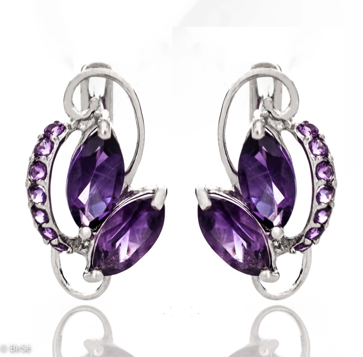 A silver masterpiece with a beautiful design - gift yourself a set of rhodium silver and magnetic natural amethyst earrings. Stand out from the rest with the complete set of earrings, ring and pendant.