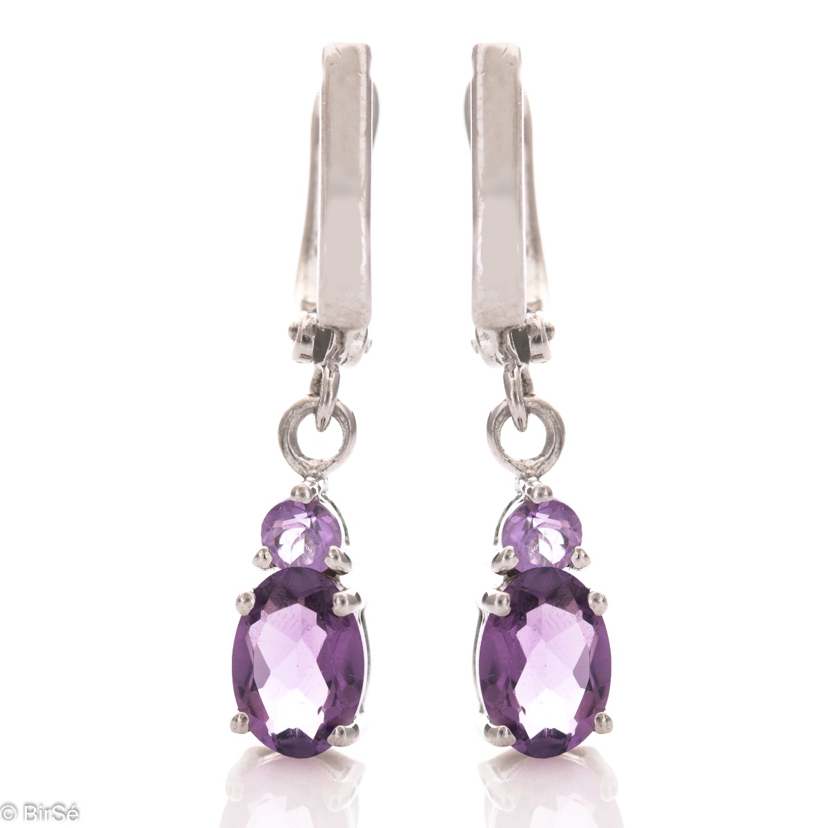 Elegant rhodium silver dangle earrings for every style - these are our magnetic soft purple amethyst earrings. Elegance yourself or a loved one with the complete set, which includes a ring and pendant with the same lovely design.