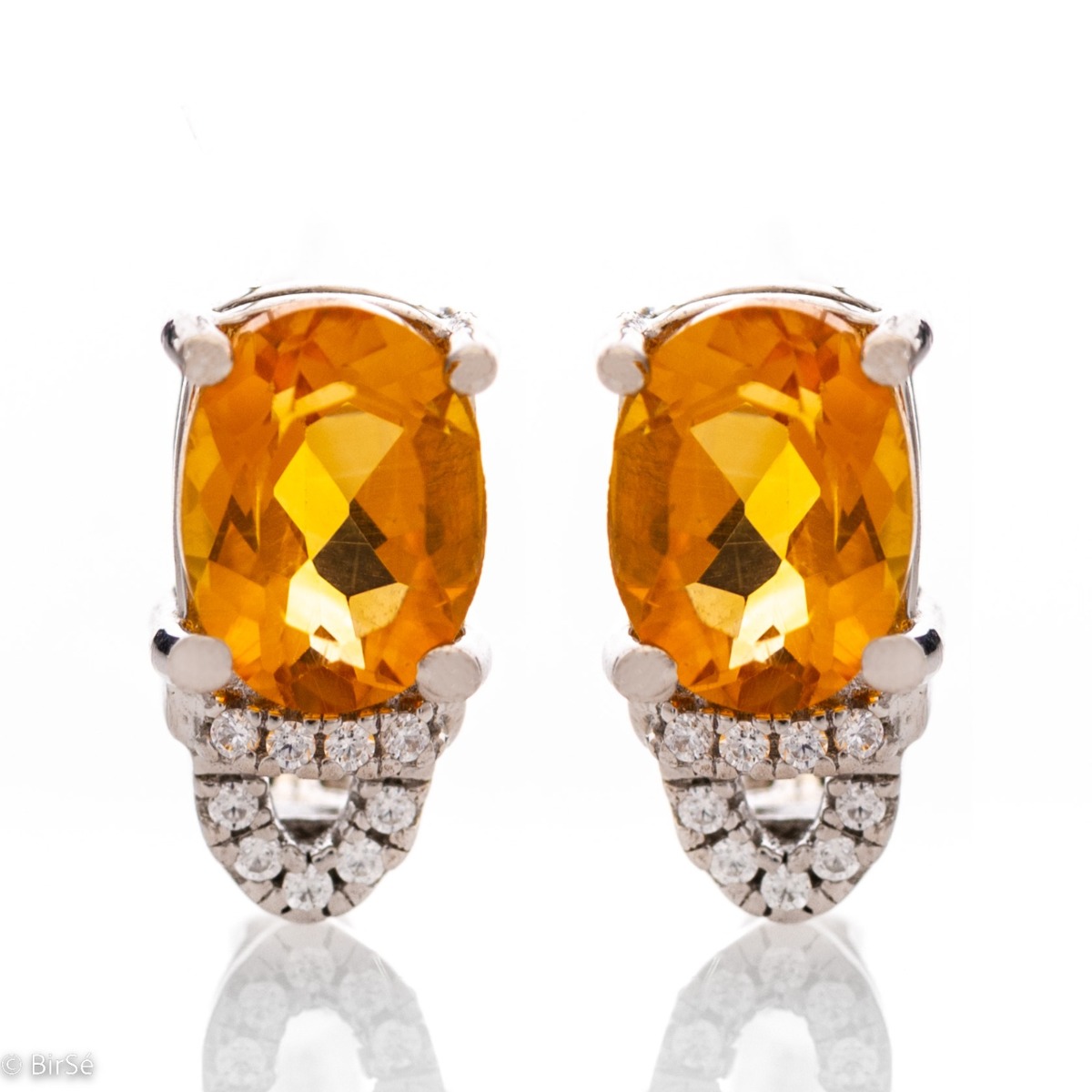 Elegant women's earrings with English clasp and radiant natural citrine, complemented by sparkling zircons and a stylish design entirely in rhodium silver.