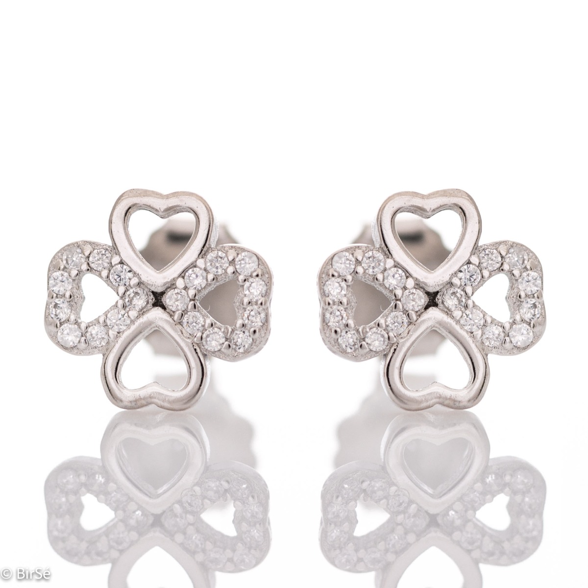 Brilliant craftsmanship of delicate clover earrings with charming design. Made entirely of rhodium-plated silver, hearts connect to form the lucky flower, beautifully decorated with the sparkle of zircons.