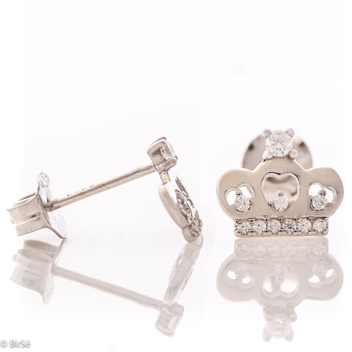 Charming women's stud earrings in the shape of beautiful crowns, complemented by sparkling fine cubic zirconias and crafted entirely in rhodium silver.