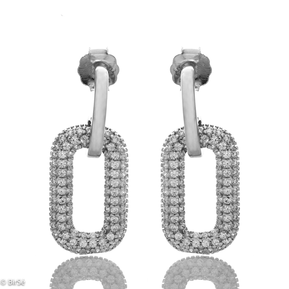 Charming women's earrings made entirely of fine rhodium silver with a dangling element elegantly decorated with fine zircons. The clasp is with a pin, and the earrings make a suitable gift for any occasion.