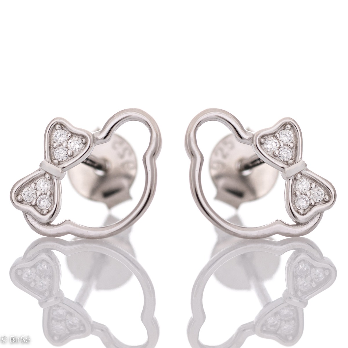 Cute children's earrings, made of shiny rhodium silver, depicting a bear's head with a ribbon of zircons. Earrings are a suitable gift for a child of any age.