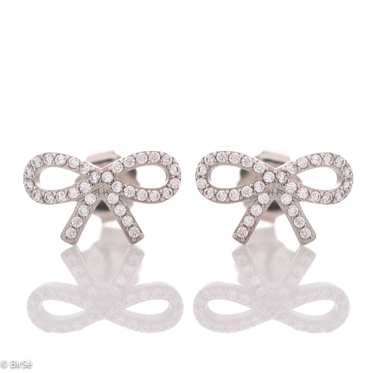 Exquisite craftsmanship of our new stud earrings and beautiful ribbon design combining unique rhodium silver and cubic zirconias.