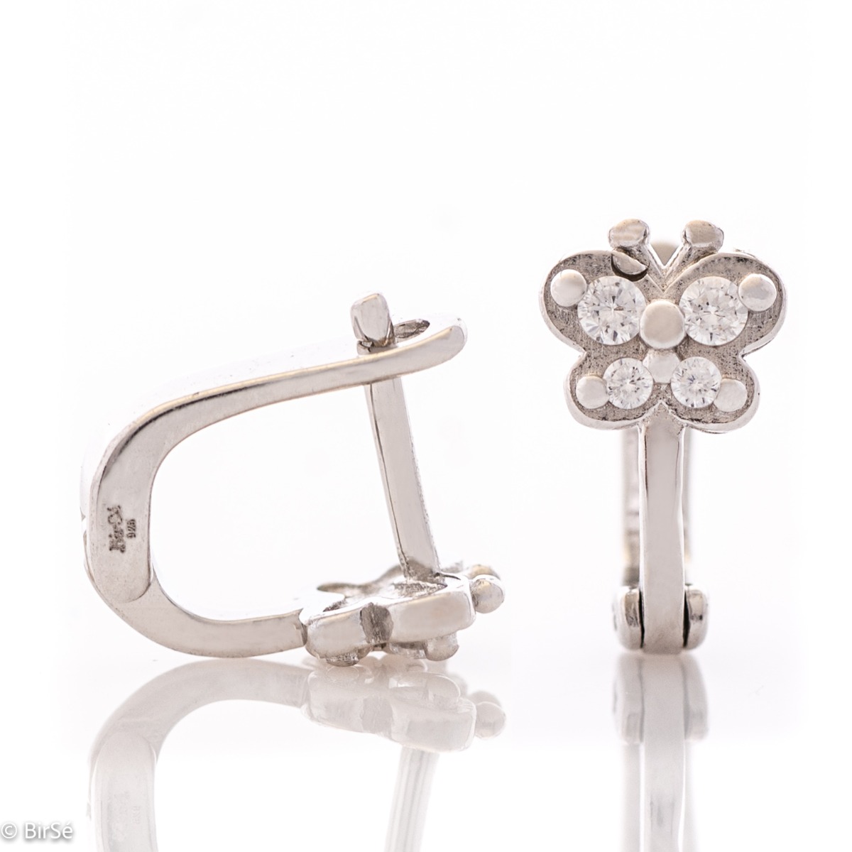 Delicate ladies' earrings made of rhodium-plated silver with a comfortable English clasp. The front side of the earrings is in the shape of exquisite butterflies, carefully decorated with zircons.