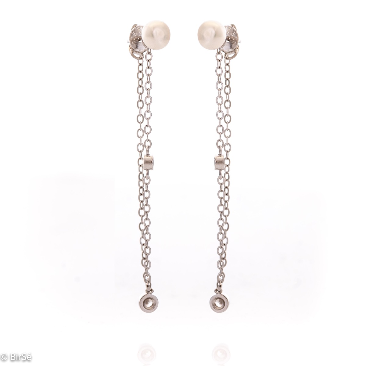 Stylish women's dangle earrings with an elegant design, completely formed by combining rhodium-plated silver with sparkling zircons and a natural pearl for opulence. The fastening is with a pin - comfortable and practical. A beautiful look for your specia