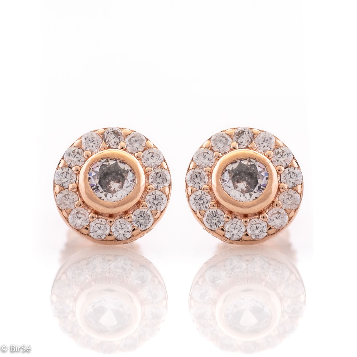 An elegant model of silver earrings, fully decorated with sparkling zircons. Screw fastening - convenient and secure. Suitable for your everyday life or to please your favorite child. Rose silver gives additional softness and charm to the jewelry.