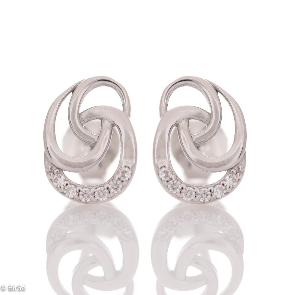 Charming silver rose earrings with dazzling zircons. Beautiful stones add extra sparkle to the delicate piece of jewelry. With pin fastening - preferred and comfortable for ladies.