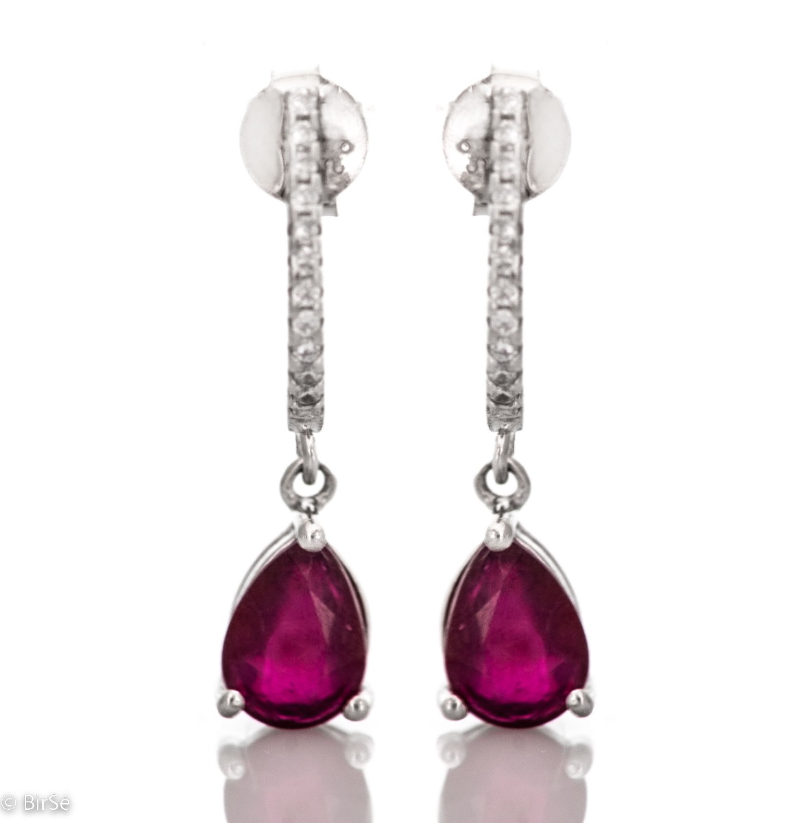 Elegant and radiant - our women's earrings with precision craftsmanship are made entirely of rhodium-plated silver and a unique natural ruby, complemented by sparkling zircons.