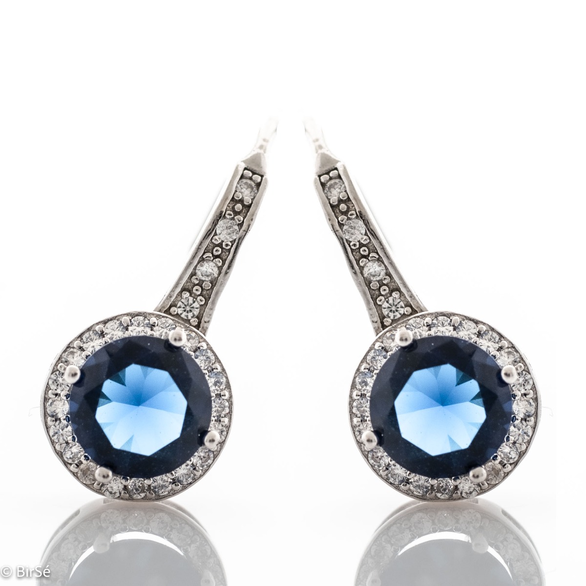 Extremely fine sterling silver earrings with a willow clasp and precise, slightly dangling craftsmanship, combining rhodium-plated silver with sparkling zircons and sapphires.