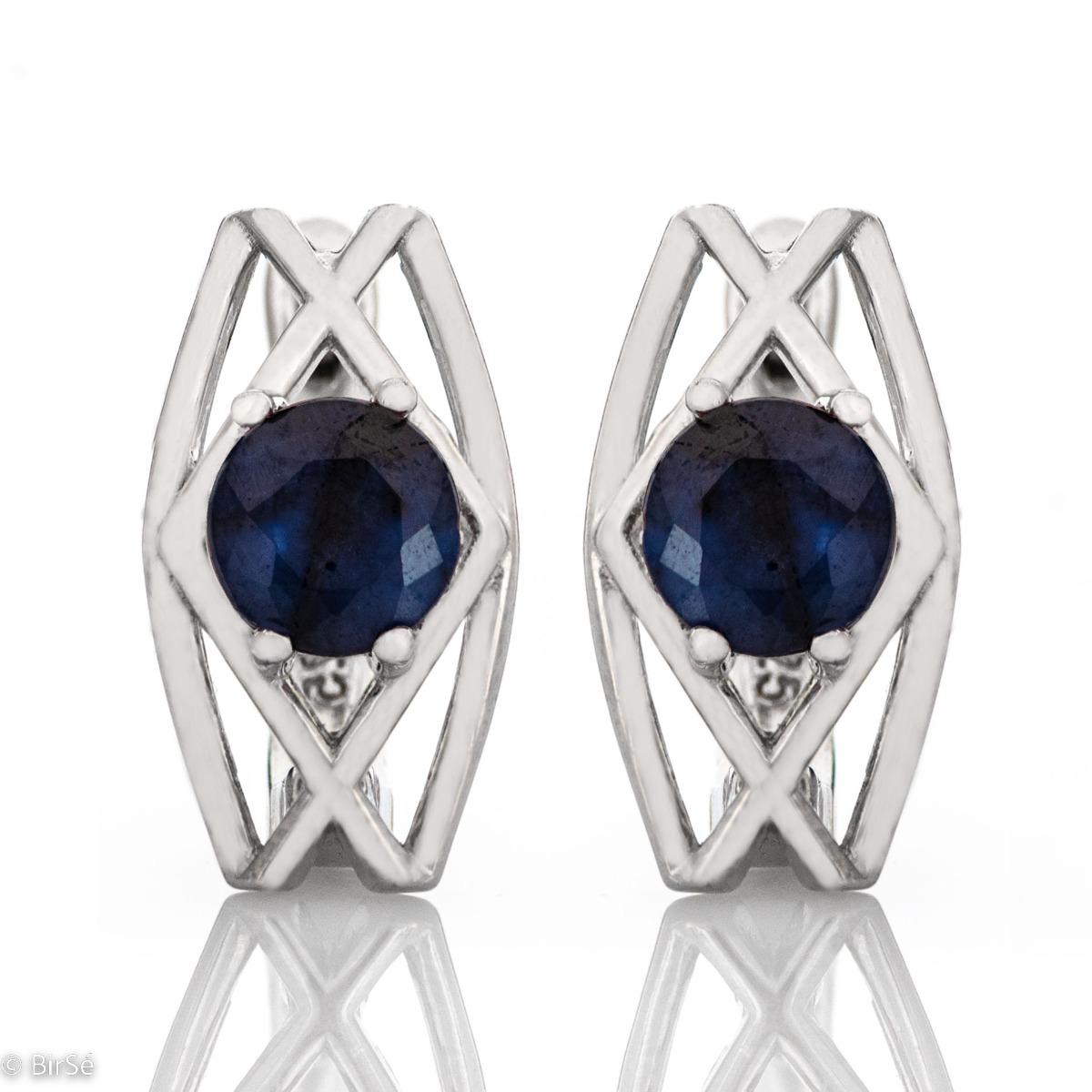 Elegant women's earrings with English clasp and exquisite workmanship entirely in rhodium-plated silver, complemented by a beautiful natural sapphire stone.