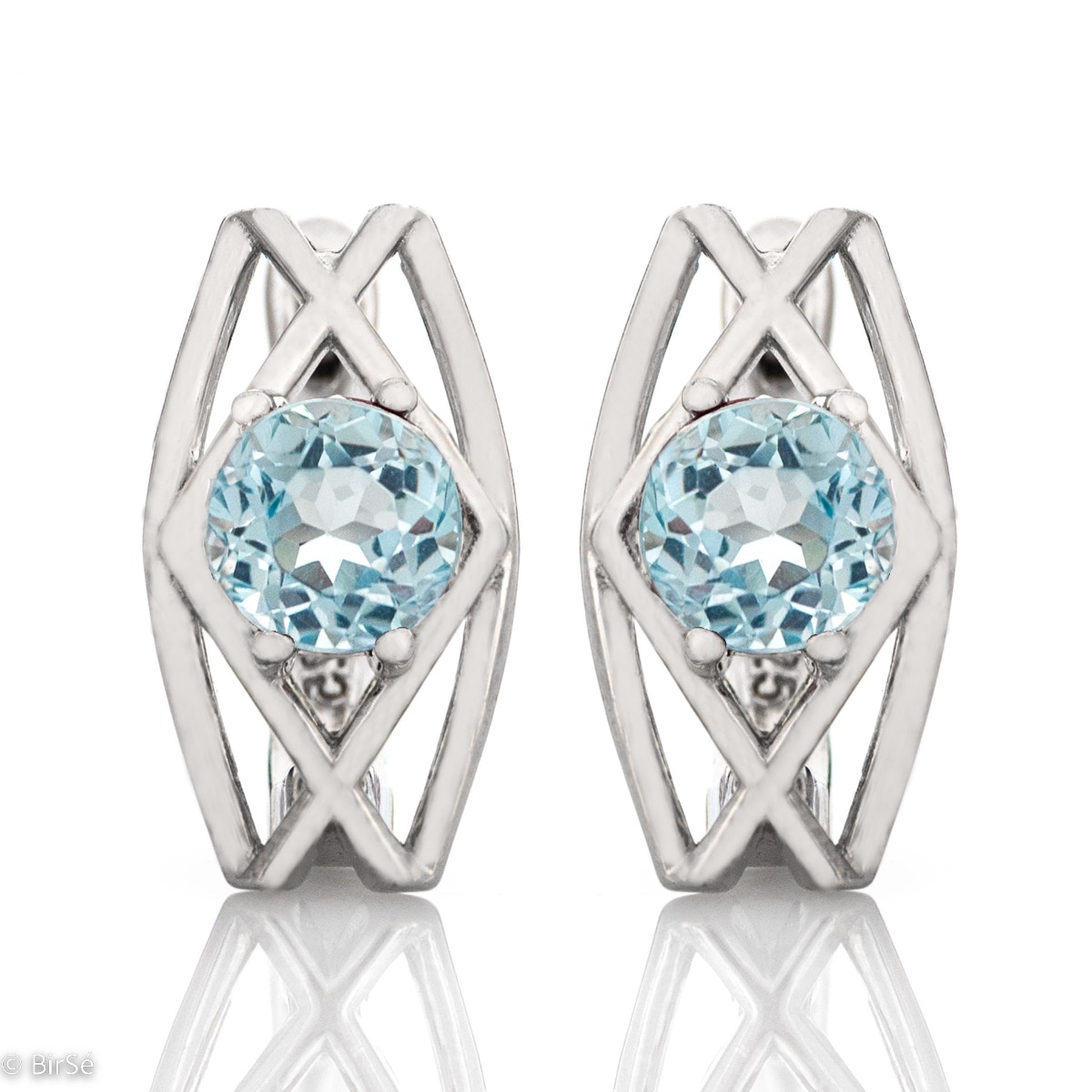 Elegant and sparkling - the earrings made of rhodium silver and natural blue topaz are the dream jewelry for every stylish lady.