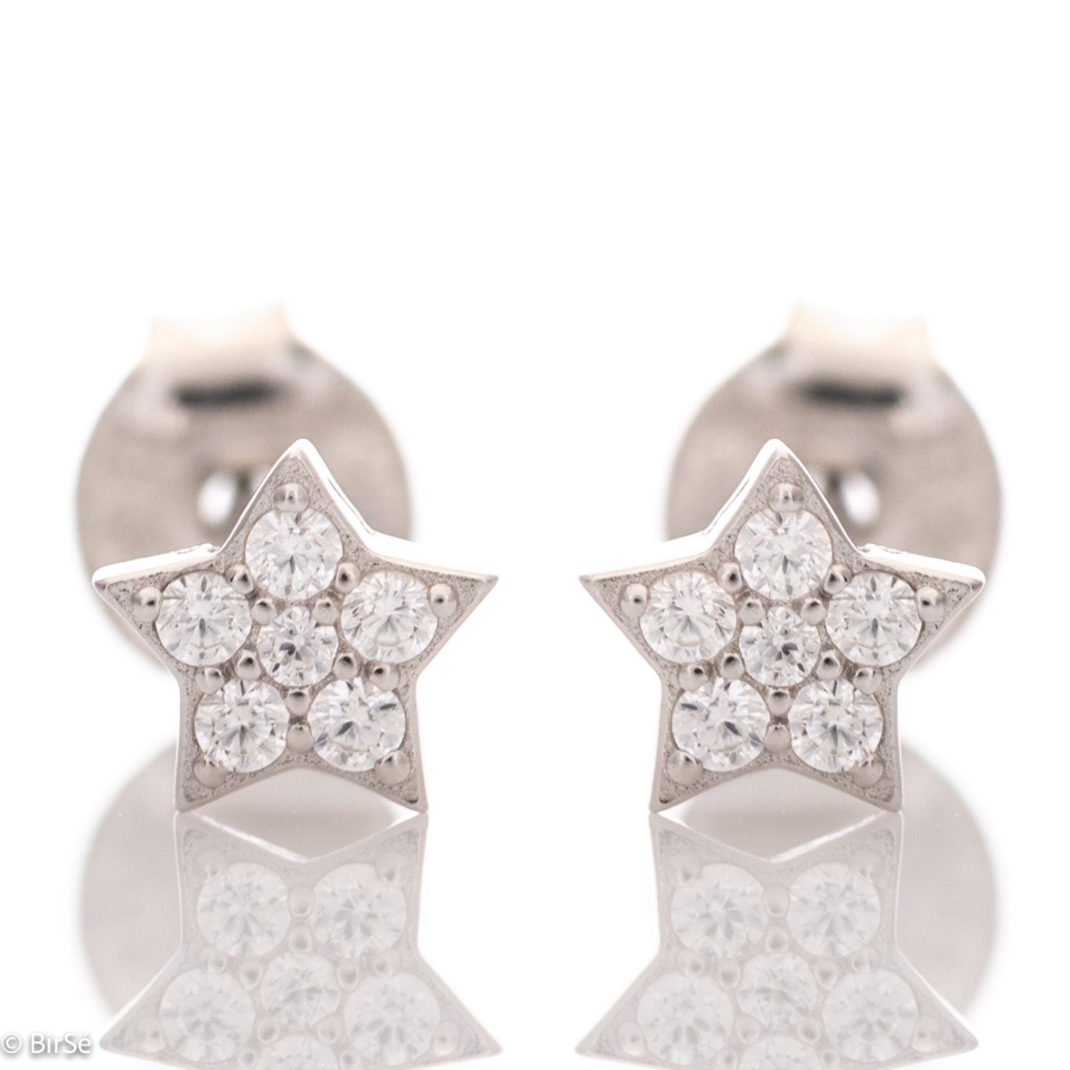 Charming women's star earrings, masterfully crafted from fine rhodium silver with an elegant design. The elements are beautifully sculpted, dazzling zircons magically sparkle, and the pin fastening is comfortable and practical.