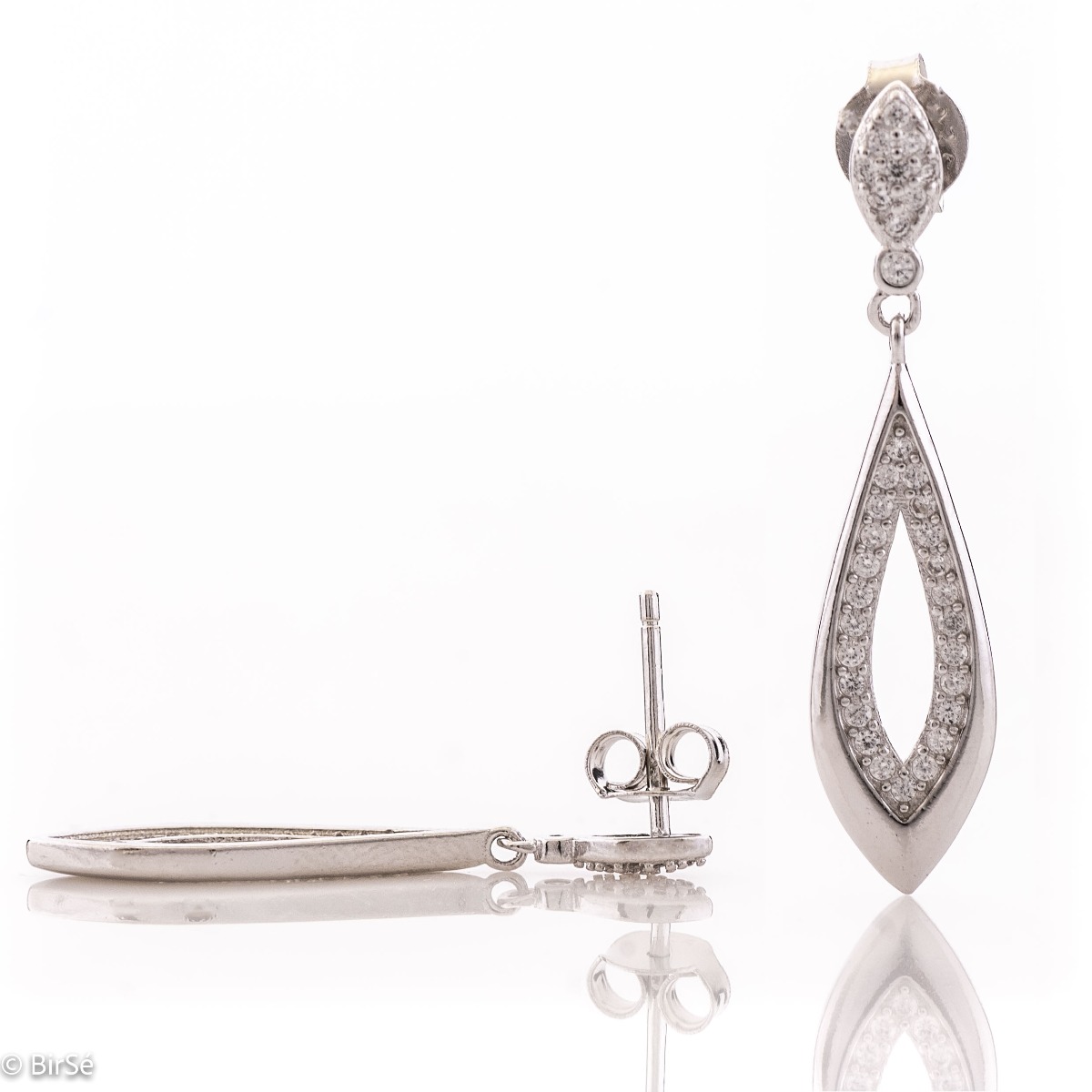 Elegant women's earrings made entirely of rhodium-plated silver and fine zircons. The graceful shape of the elements, the shine of the zircons and the elongated model turn the earrings into a piece of jewelry suitable for special occasions.