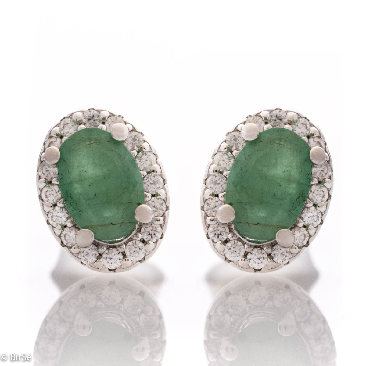 Divine Vision - Amazing silver earrings with a spectacular look and stud fastening. An elegant composition made of a fine combination of rhodium-plated silver with an exquisite emerald and dazzling zircons.