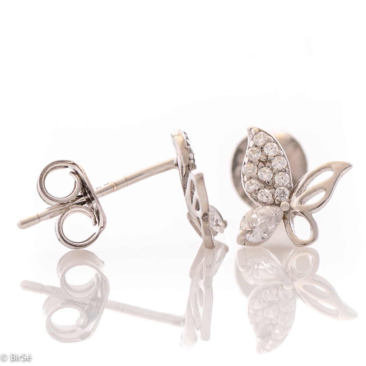 Charming earrings in soft rhodium silver in the shape of a butterfly encrusted with zircons. The earrings are suitable for children and young girls. Pin fastening is comfortable and secure.