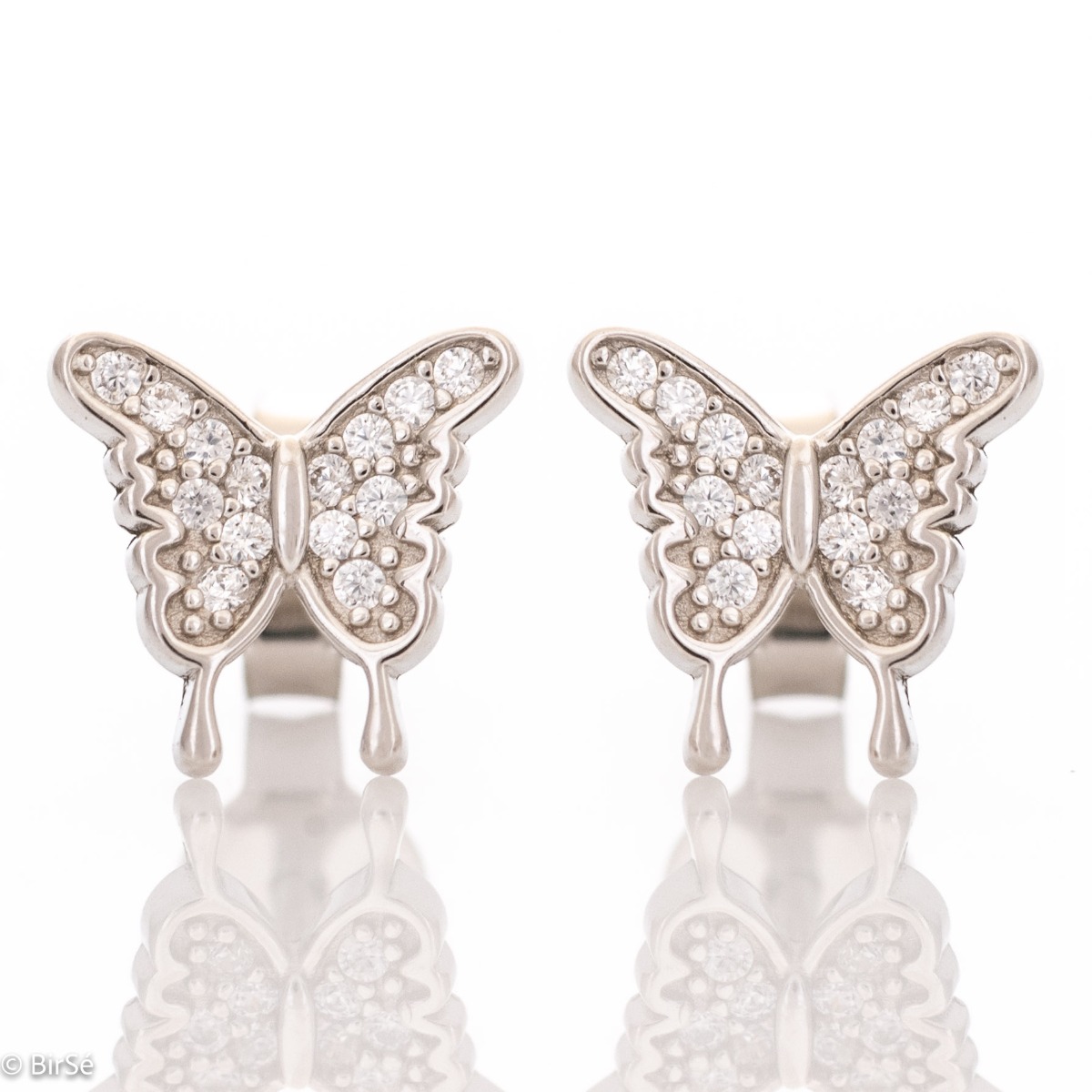 Captivating ladies' butterfly earrings. They are made entirely of rhodium-plated silver and have a convenient pin fastening. They can be combined with a pendant of the same model. Encrusted with sparkling zircons, these earrings make a wonderful gift for 