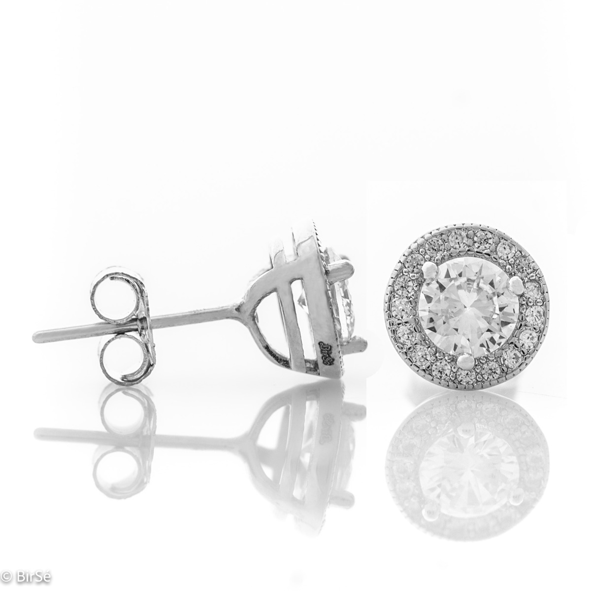 Fine sterling silver stud earrings with round and precise craftsmanship entirely in rhodium silver, combined with numerous sparkling zircons and a central one.