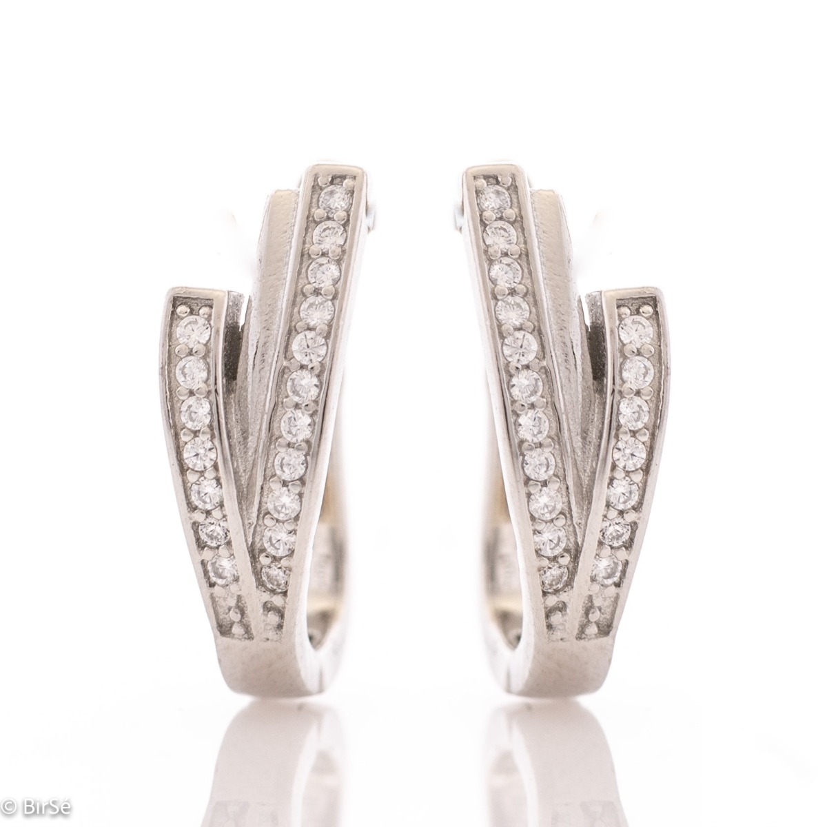 Captivating women's earrings with a spectacular shape and modern design. Made entirely of rhodium-plated fine silver with the convenient English clasp, they are a wonderful gift for your beloved woman's everyday outfit and wonderful mood. And the added zi