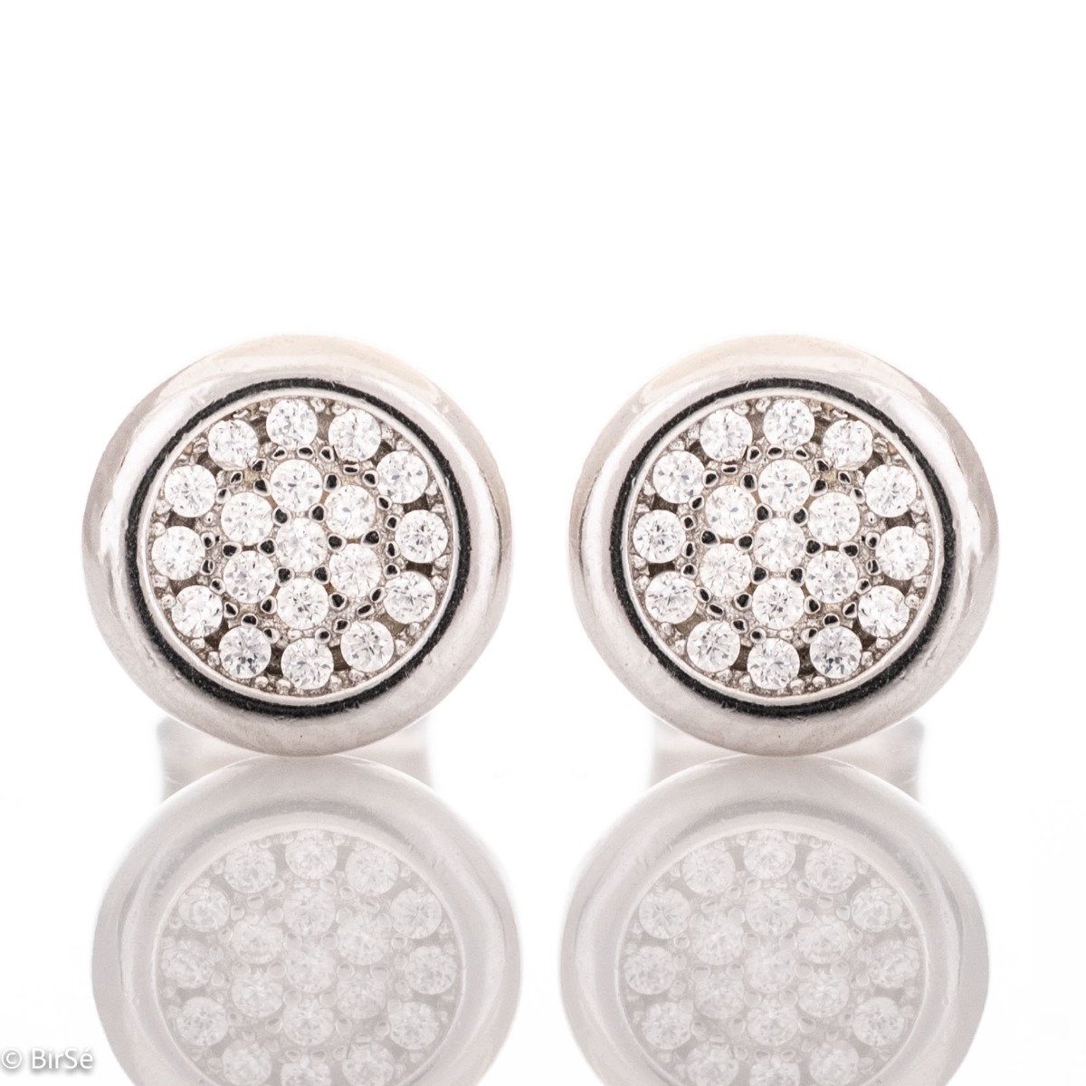 Charming earrings in fine rhodium silver, with delicate precision craftsmanship and an extremely spectacular pattern decorated with zircons. Earrings are a suitable piece of jewelry for a daily outfit or for a special occasion.