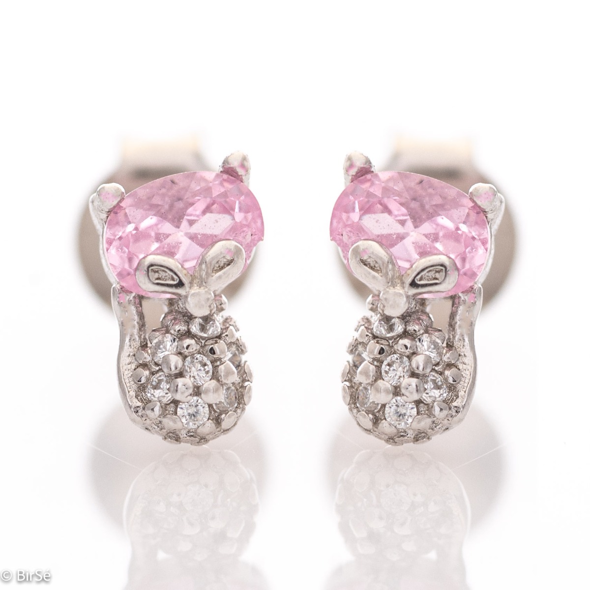 Charming delicate earrings made entirely of rhodium-plated sterling silver that gracefully embrace a beautiful pink stone. Its lovely shine is further enhanced by countless fine zircons. The earrings have a pin fastening and are suitable for both children