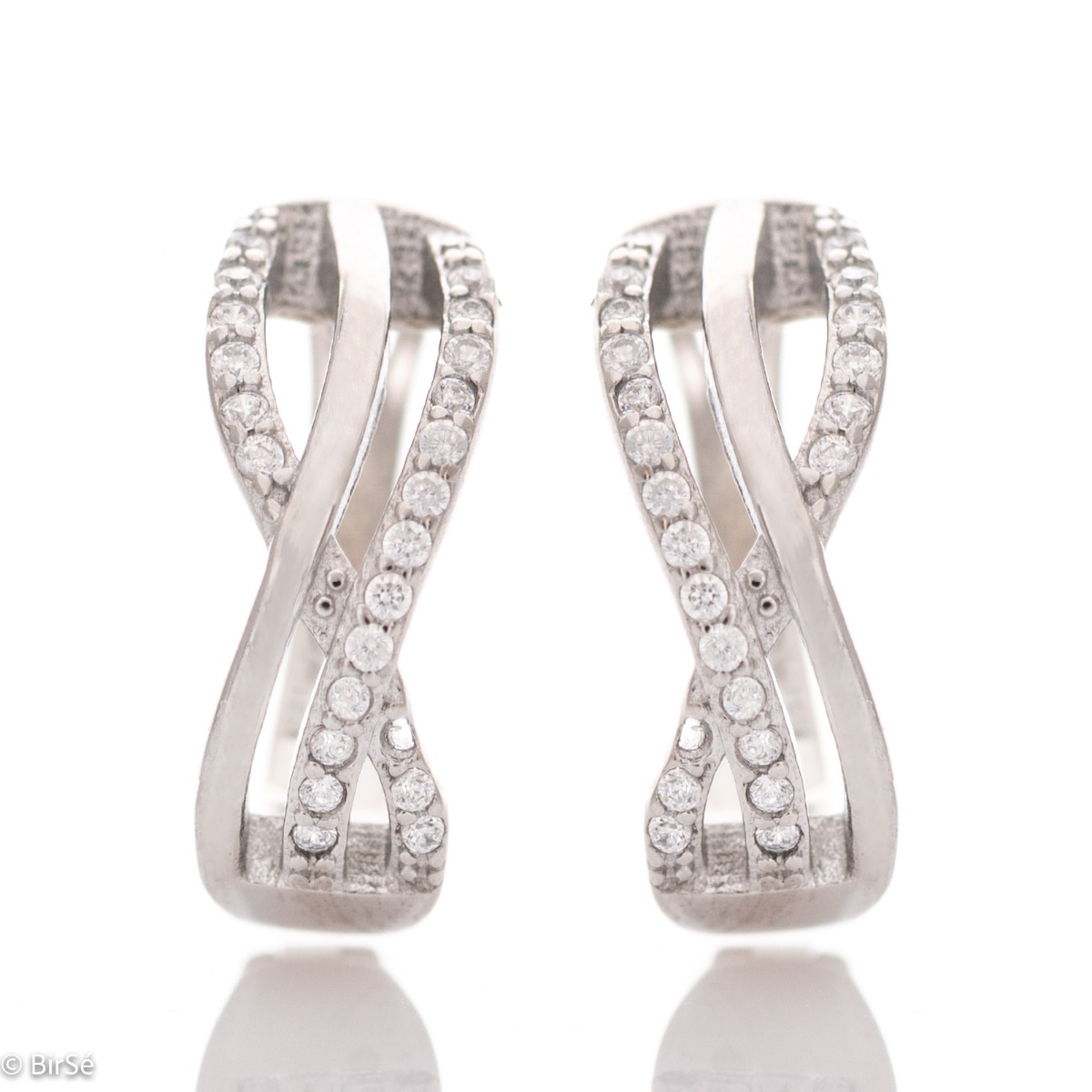 Elegant earrings with a stylish design, fine elements of rhodium-plated silver, decorated with sparkling zircons. The earrings have an English fastening - practical and secure.