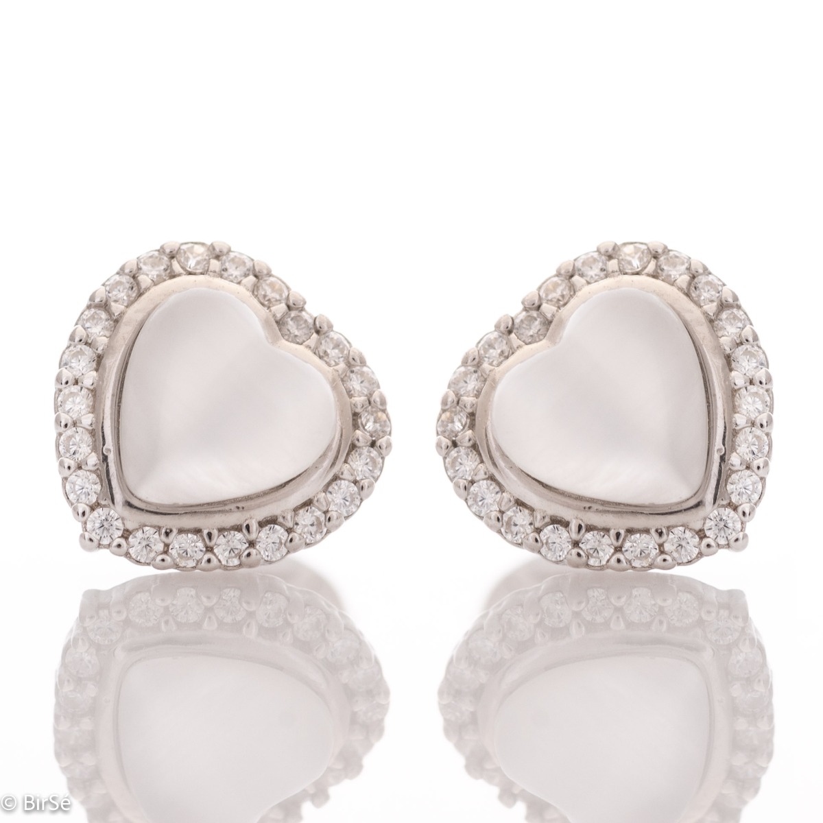 Charming earrings in fine rhodium silver, with delicate precision craftsmanship and an extremely impressive heart pattern with zircons. Earrings are a suitable piece of jewelry for a daily outfit or for a special occasion.