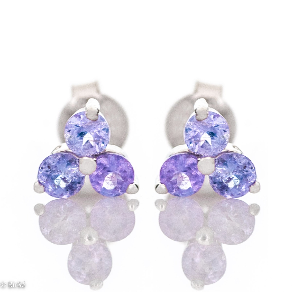 Light and spectacular - these are the earrings made of rhodium silver and natural tanzanite, which with their delicate shape will add grace to your face.