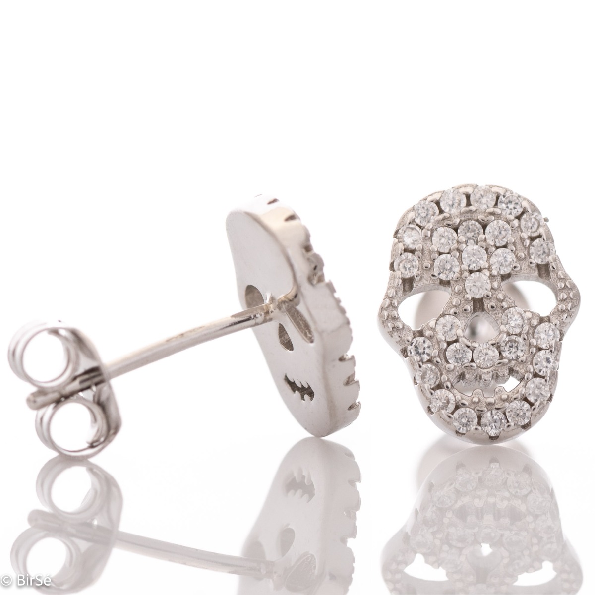 Eccentric women's earrings in fine rhodium silver, with an interesting skull design, covered with zircons. Earrings are a suitable gift for women who admire the unconventional style in jewelry.