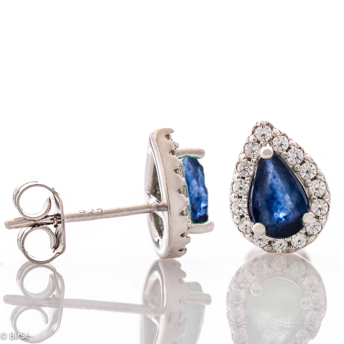 Radiant stud earrings delicately crafted in a teardrop shape and finely rhodium-plated sterling silver, complemented by exquisite natural sapphires and sparkling zircons.